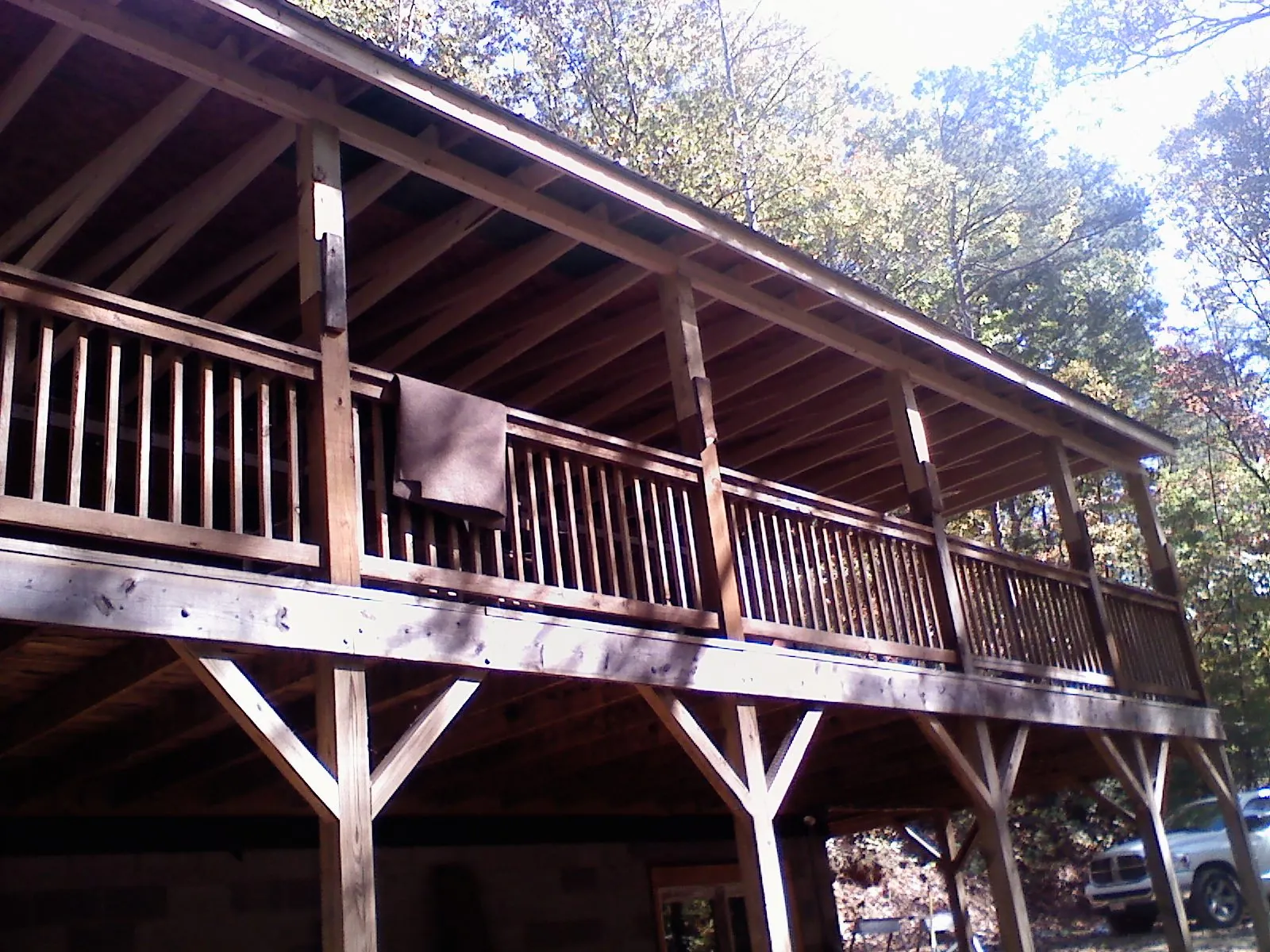 Timber framing under a new elevated porch and deck — Roof Leak Repair in Cost by Roofing Brothers